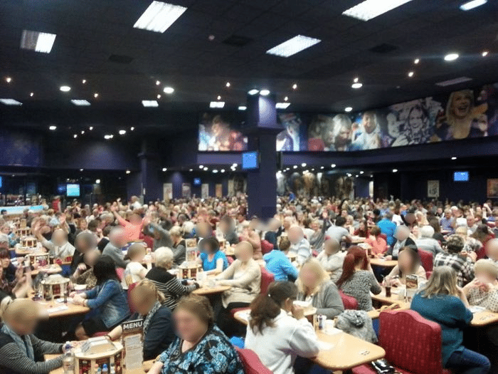 Lots of people inside the bingo club